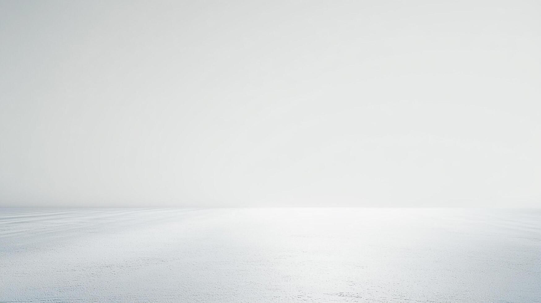 A vast, foggy landscape with a smooth icy surface and soft lighting creates a minimalist style, making it a perfect background for a wide range of designs. photo