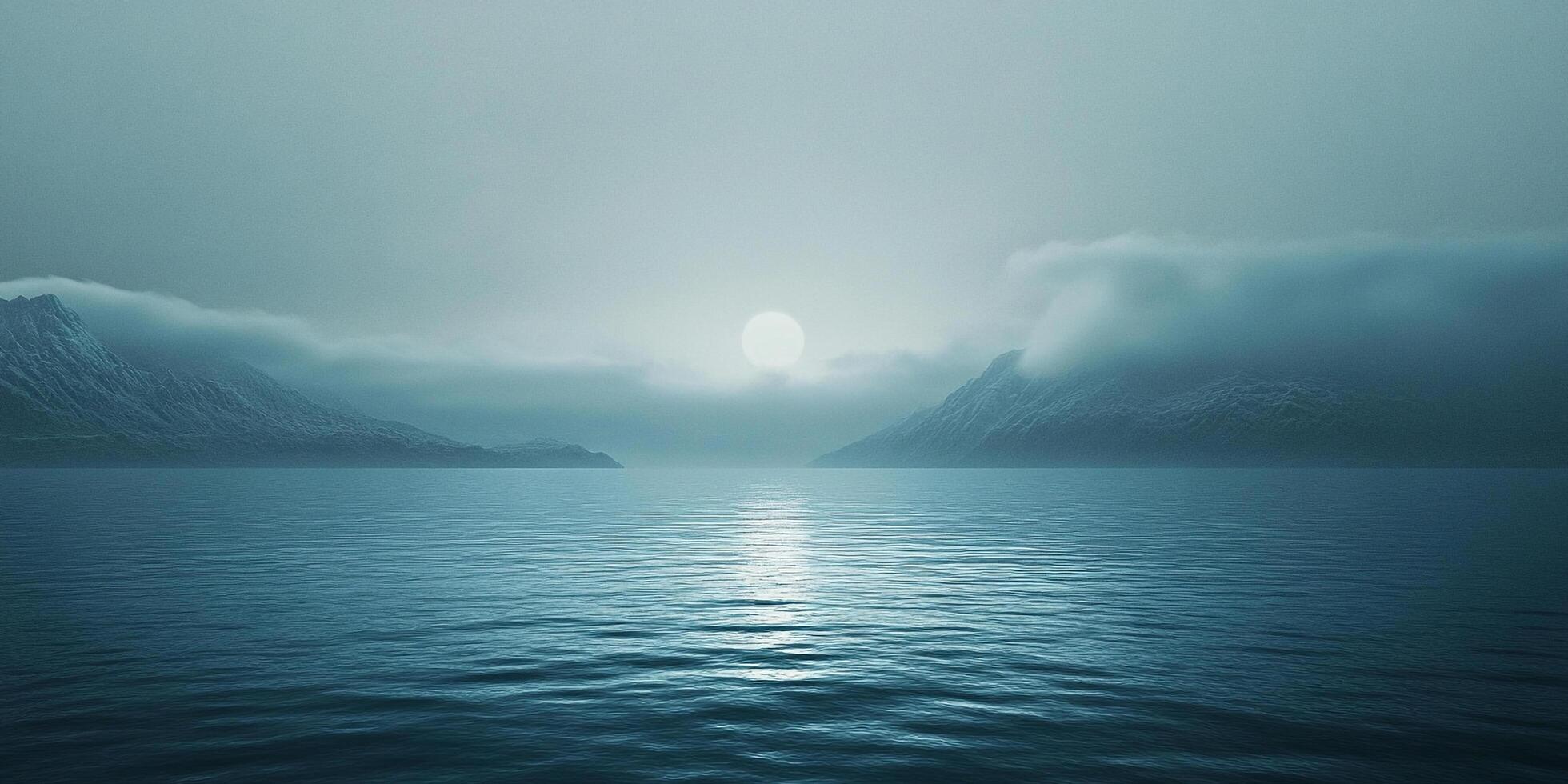 Mist drifts over the blue water, obscuring mountain peaks as the sun reflects on the serene ocean's surface in the distance. photo