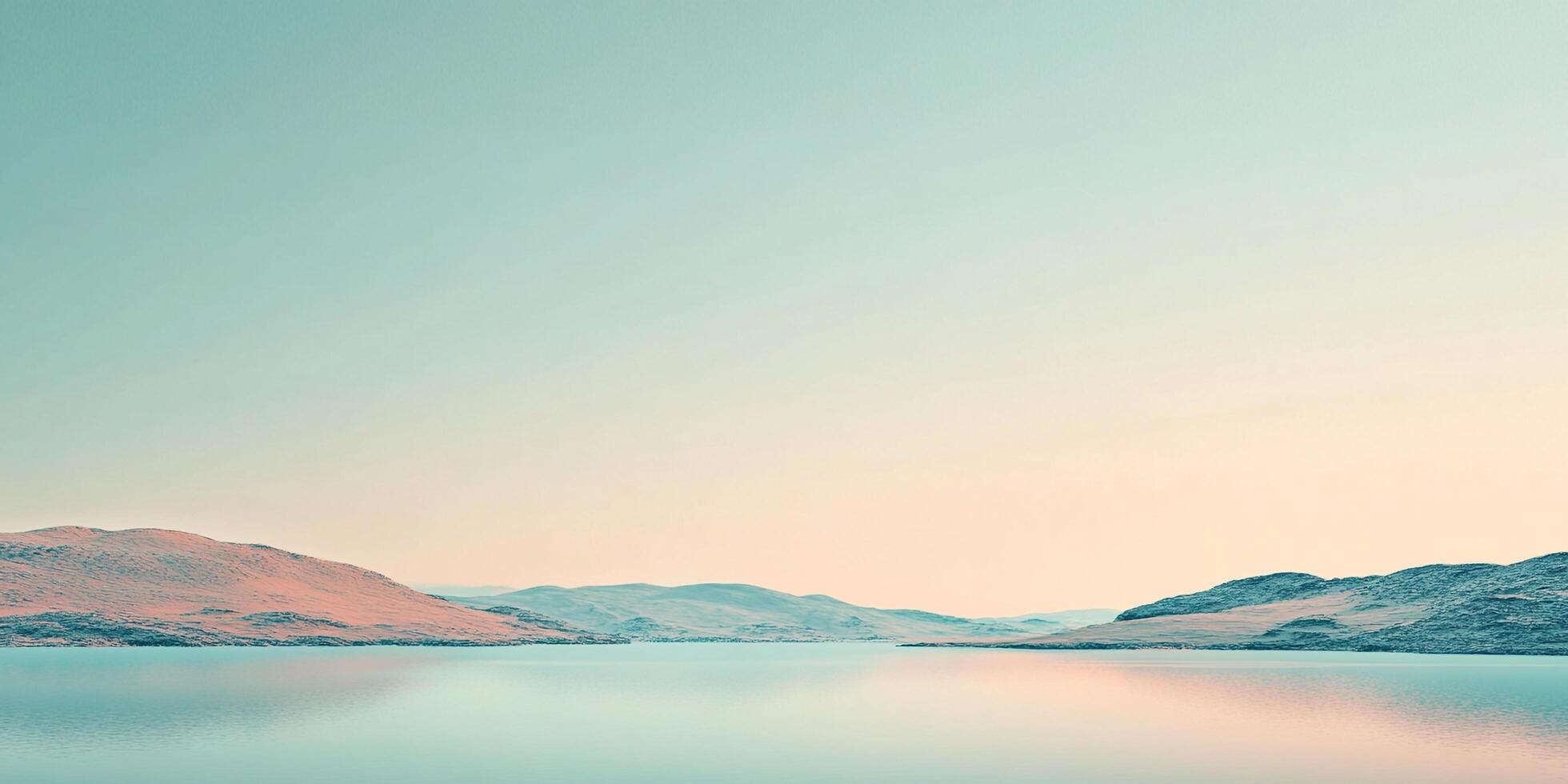 Scenic landscape featuring a serene lake reflecting the pastel colors of the sky, with distant hills adding depth and tranquility. photo