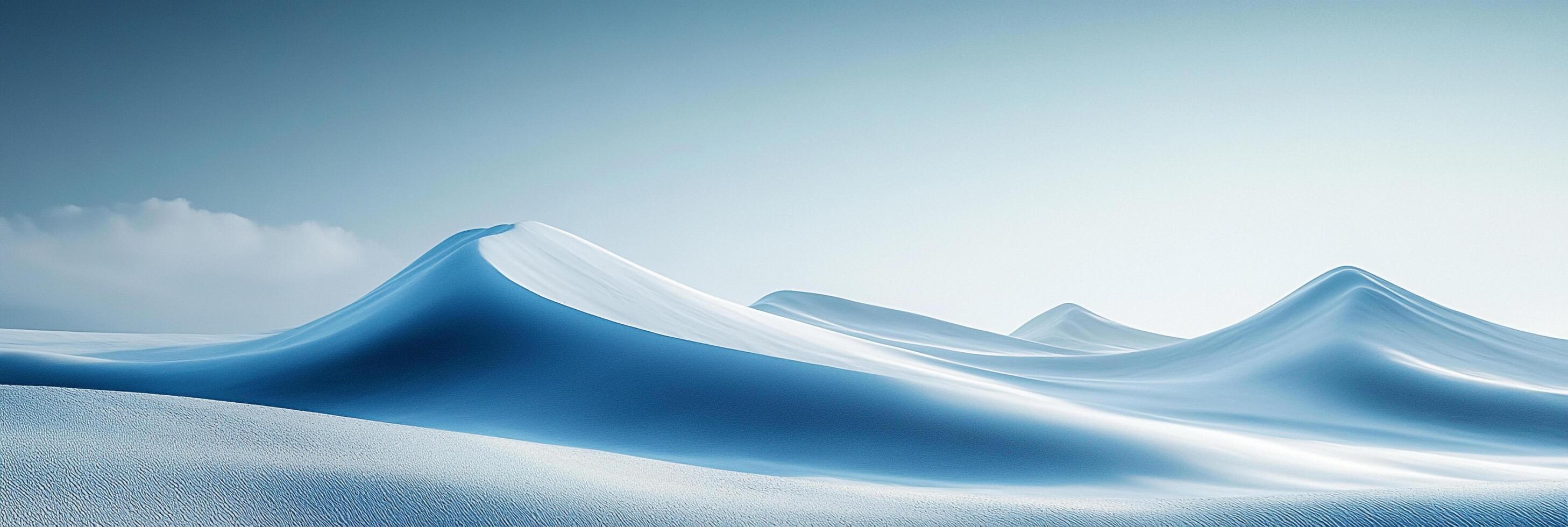 Serene landscape of rolling hills covered in snow, bathed in soft light under a clear sky, evoking tranquility and minimalist beauty. photo