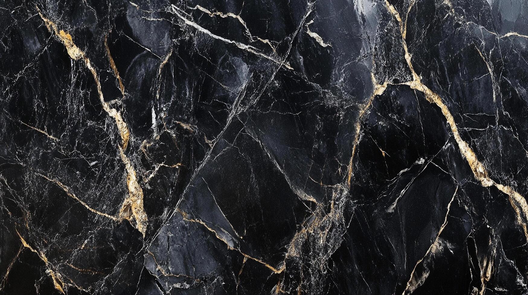 Striking black marble with gold veining. A natural stone pattern of darkness and light creates a luxurious and elegant surface. photo