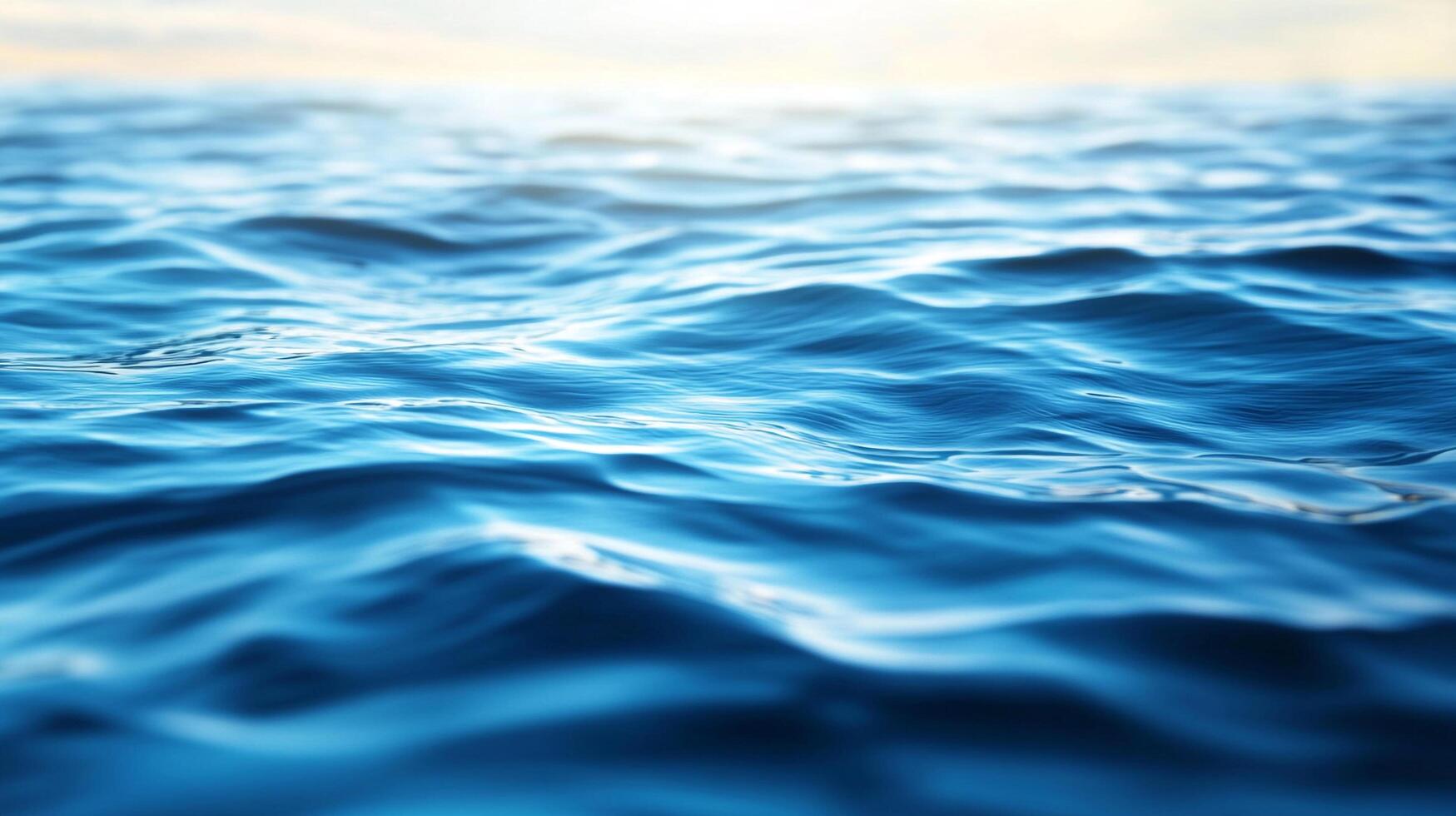 A serene view of the ocean's surface showcases gentle waves and an infinite horizon, creating a peaceful and calming seascape atmosphere. photo