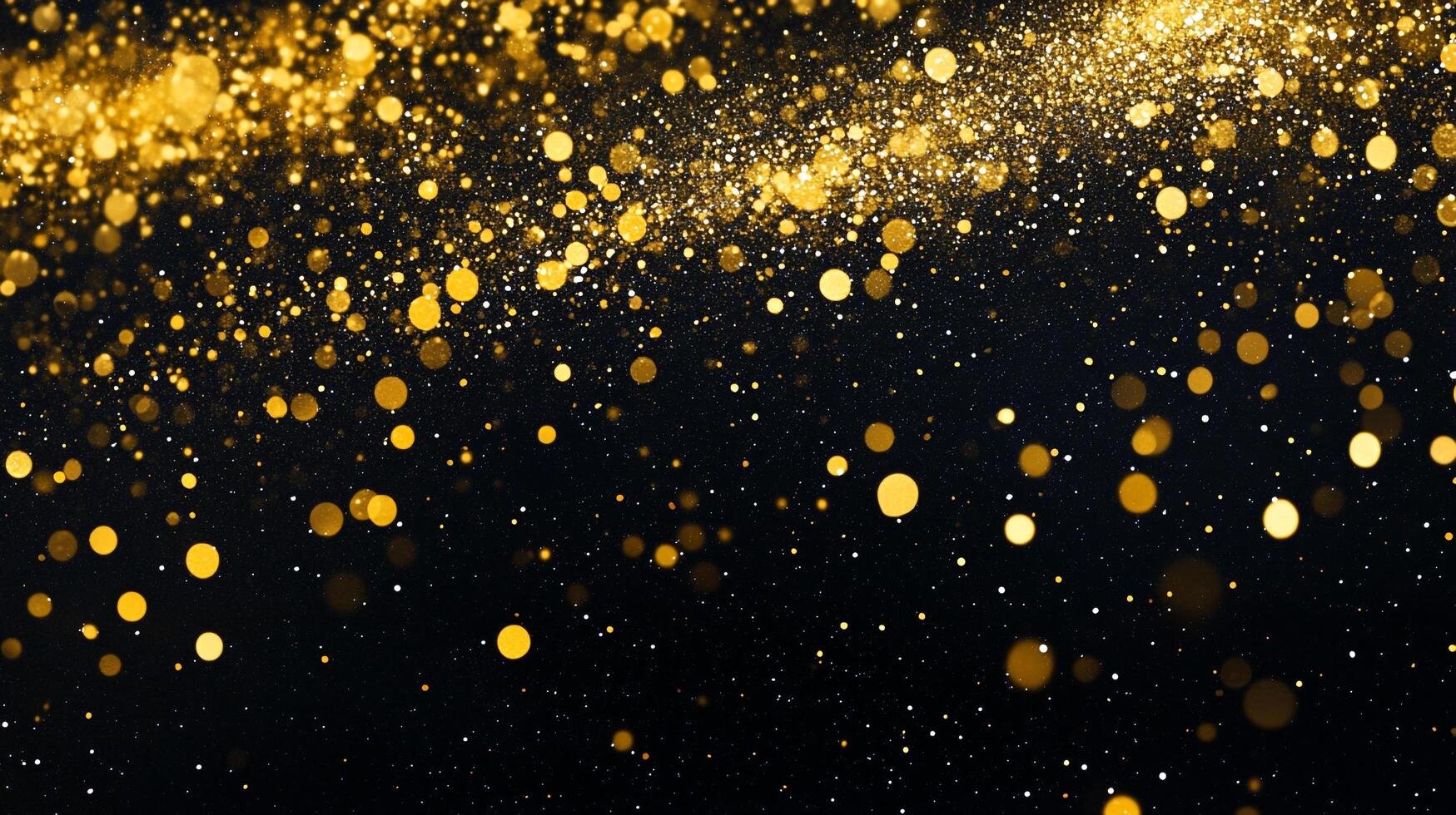 Black background with gold glitter. The glitter is scattered all over the background photo