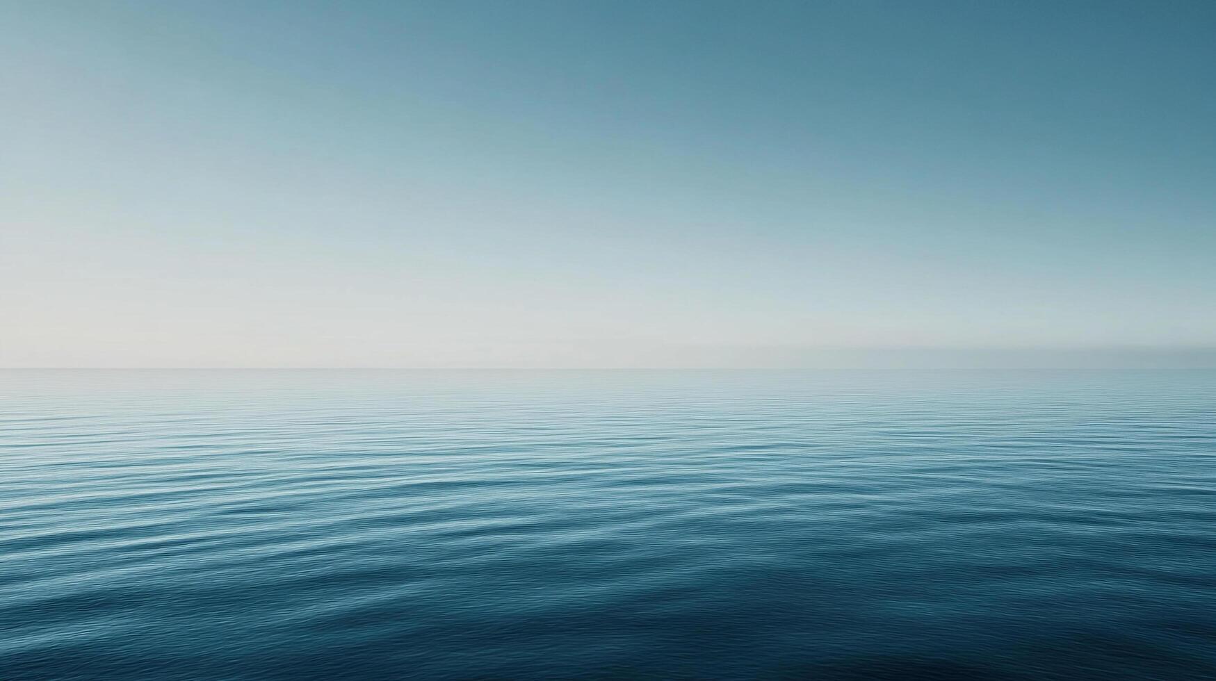 Serene ocean view, featuring calm blue waters meeting a pale sky horizon, creating a peaceful and contemplative atmosphere. photo