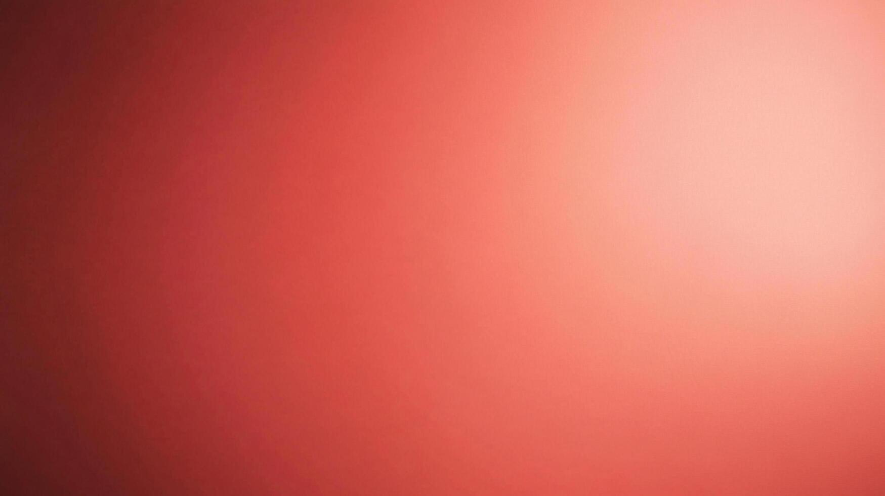 Gradient of warm red tones shifting from dark to light, creating a soft, vibrant backdrop suitable for various creative applications. photo