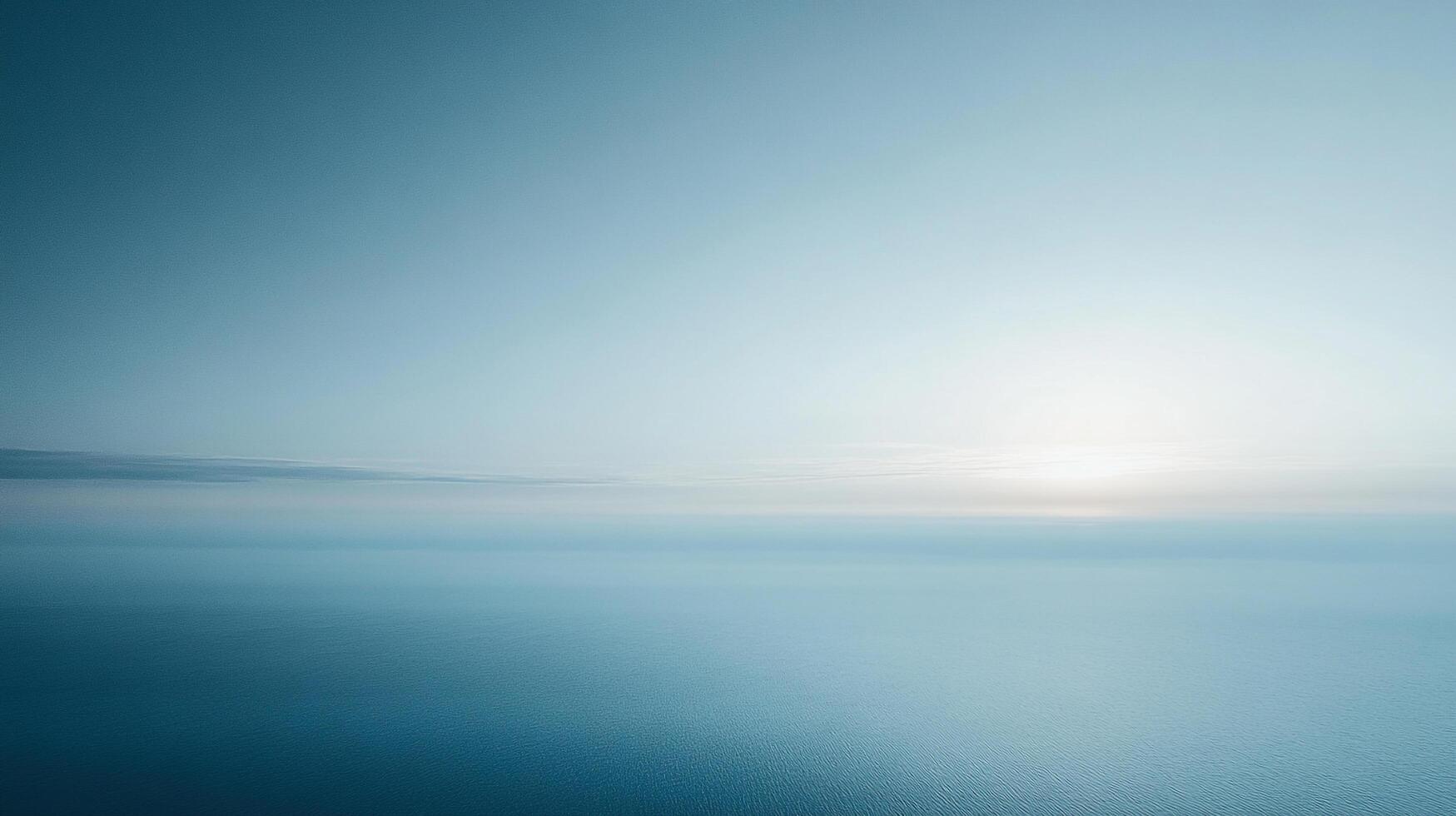 Vast expanse of serene ocean meeting a tranquil sky, creating a sense of peace and boundless horizon with soft hues and gentle gradient. photo