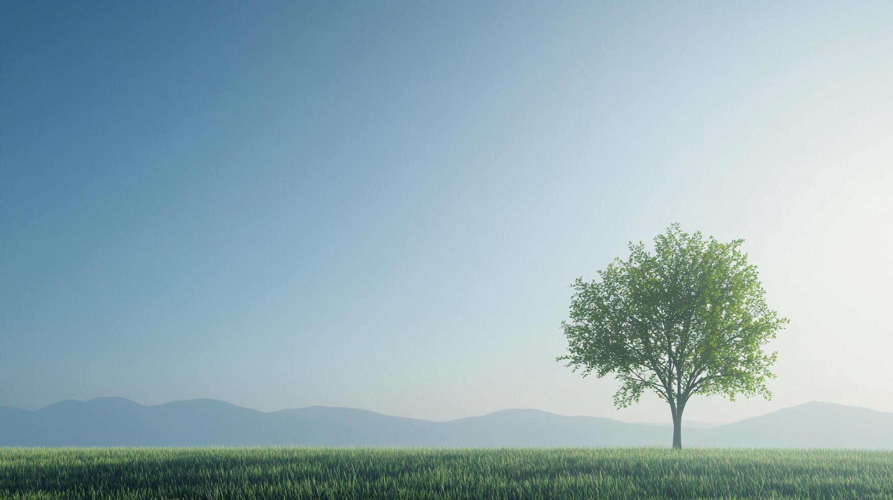 A serene landscape featuring a lone tree standing tall in a grassy field under a clear blue sky, with distant mountains in the background. photo