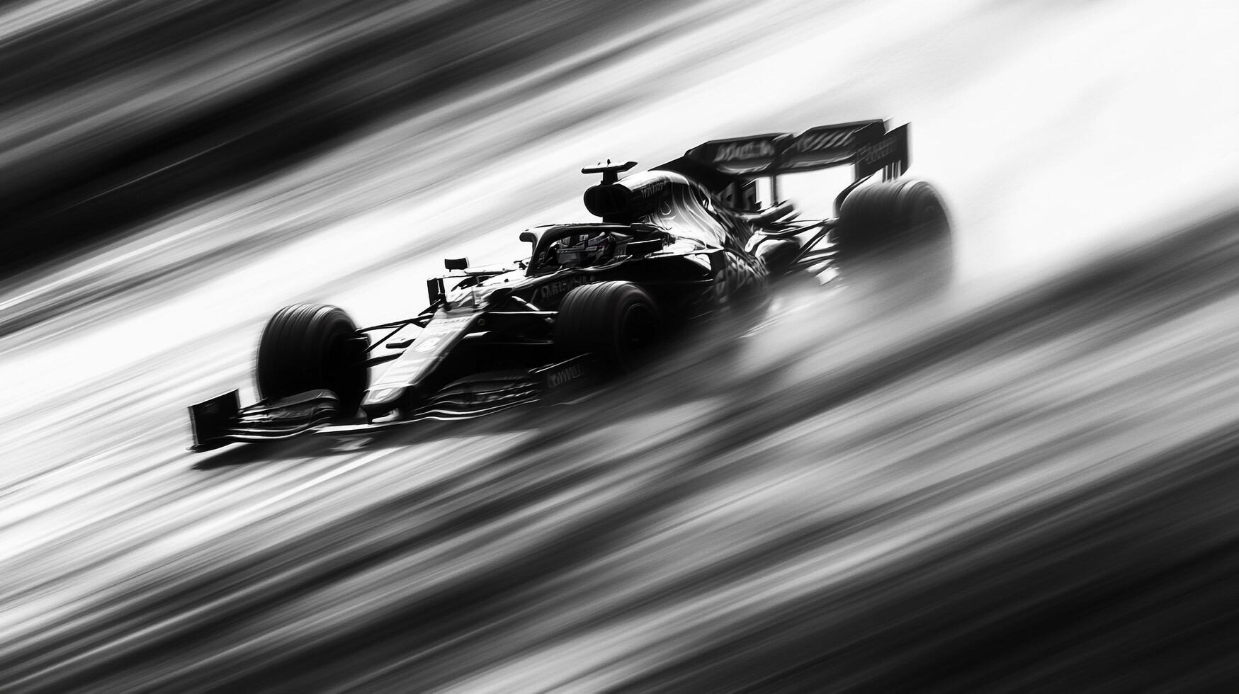 High-speed motion blur captures a race car speeding down the track, emphasizing velocity and competition, rendered in stark monochrome. photo