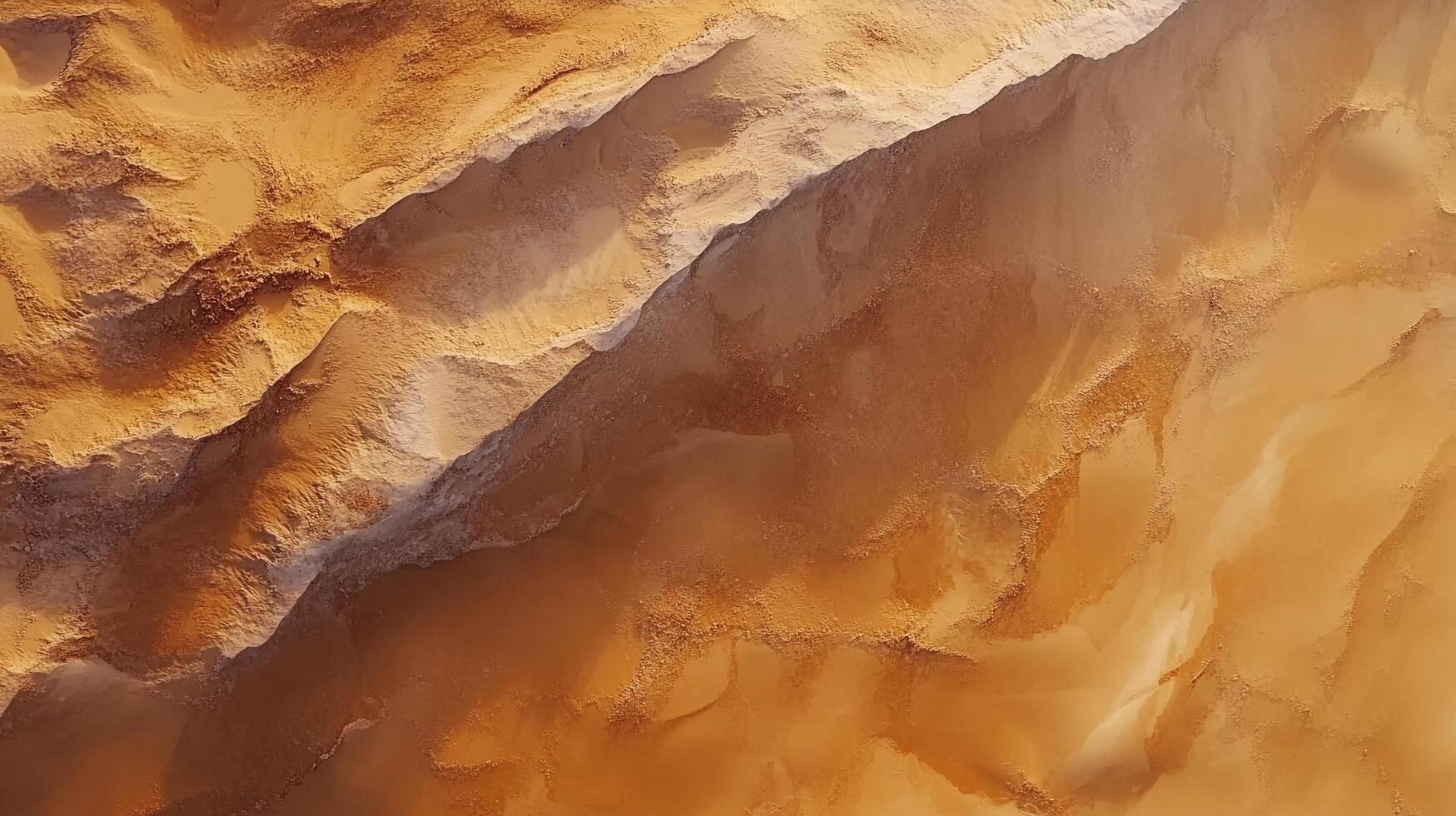Eroded terrain creates striking patterns and textures. The landscape looks like a Martian surface with different types of soil. photo
