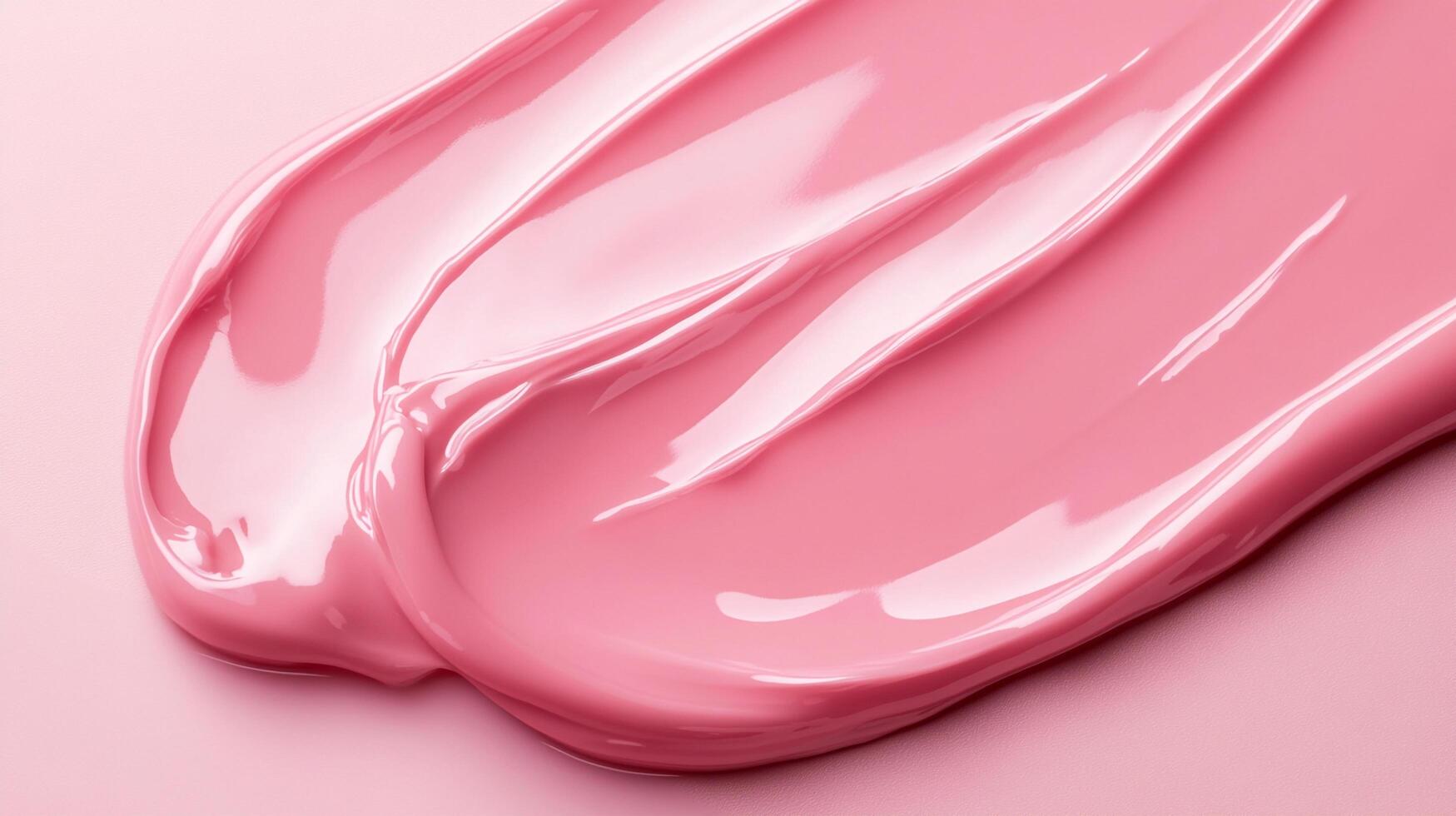 Abstract pink cream with a glossy, smooth texture, laid out in textured lines on a matching pink backdrop, creating a visually appealing aesthetic. photo