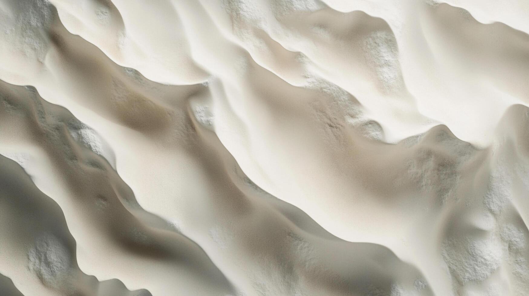 Aerial view of smooth, flowing sand dunes, showcasing their natural, undulating formations. Light and shadows create texture. photo