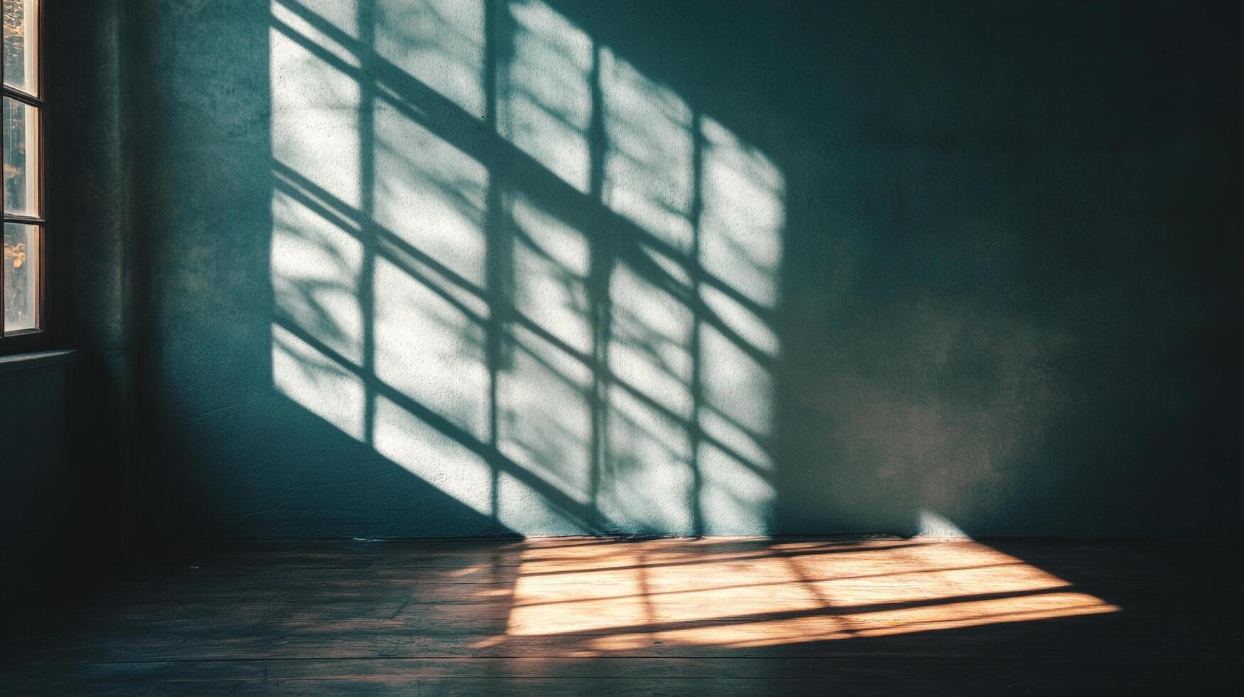 Window light and shadows cast geometric shapes across a textured wall and wooden floor creating a moody, minimalist interior scene. photo