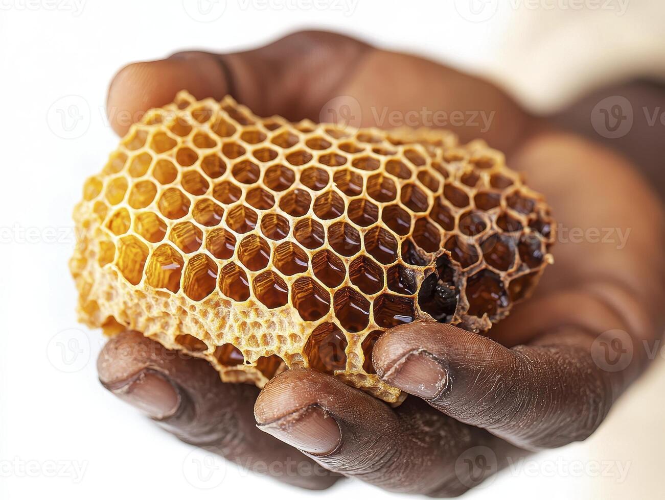 Capturing the Essence of Nature's Sweetness A Detailed Look at Raw Honeycomb Held in Gentle Hands, Highlighting the Intricate Beauty of Bee-Made Structures, Showcasing the Golden Hues and Textural photo