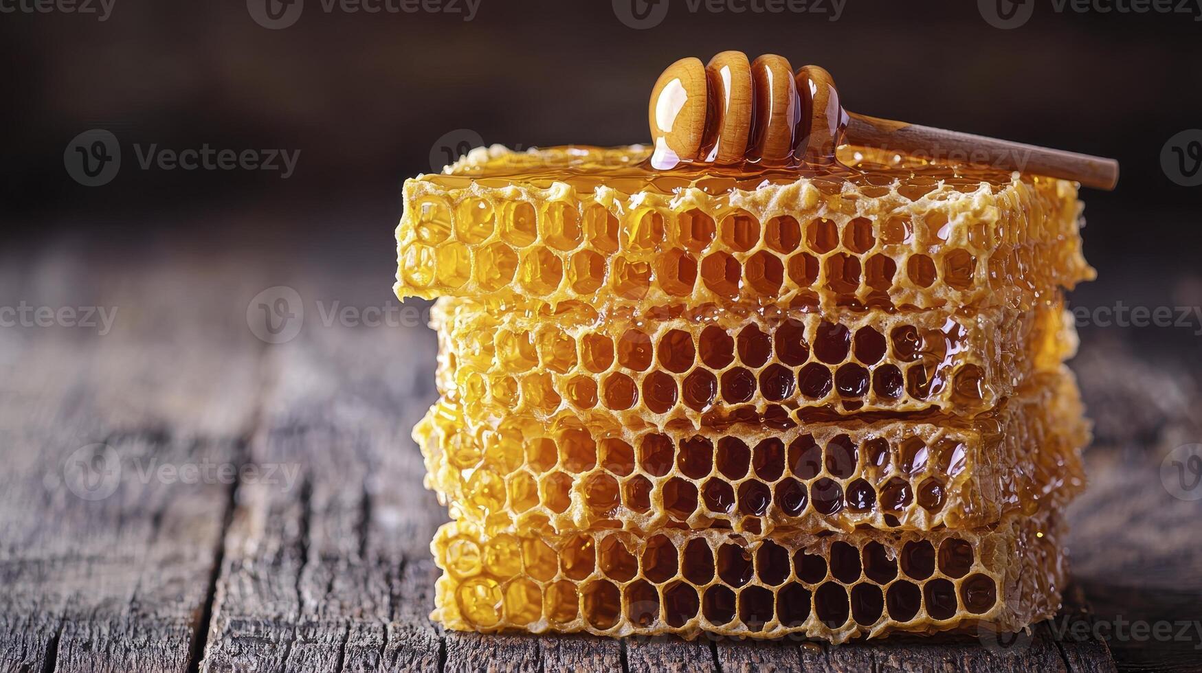 Discover the Golden Elixir A Captivating Close-Up of Natural Honeycomb, showcasing its intricate hexagonal cells filled with glistening, amber-hued honey, dripping with sweet goodness Explore the photo
