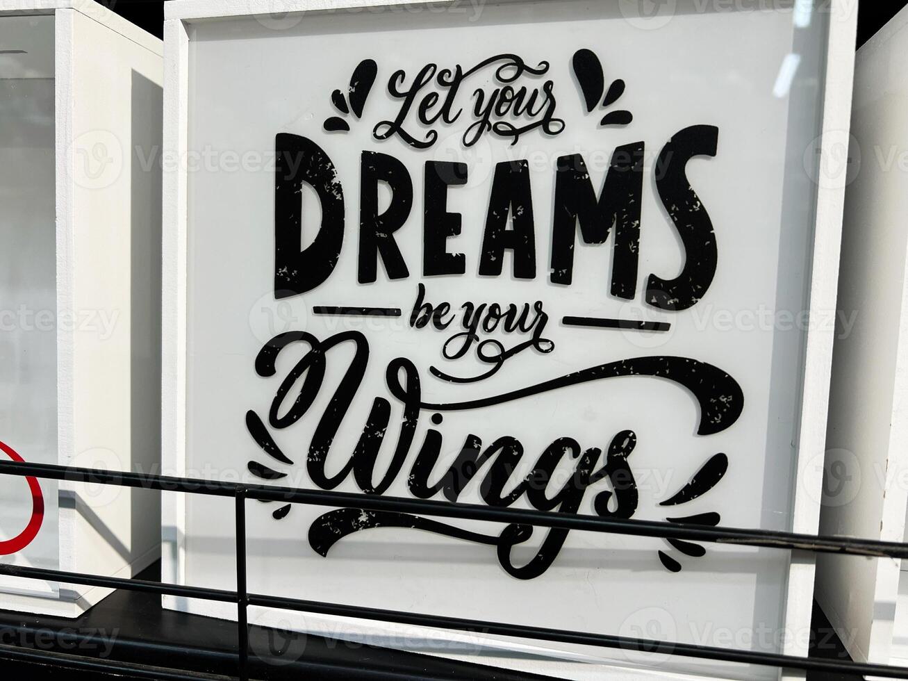 Motivational poster with inspirational quote encouraging dreams and aspirations photo