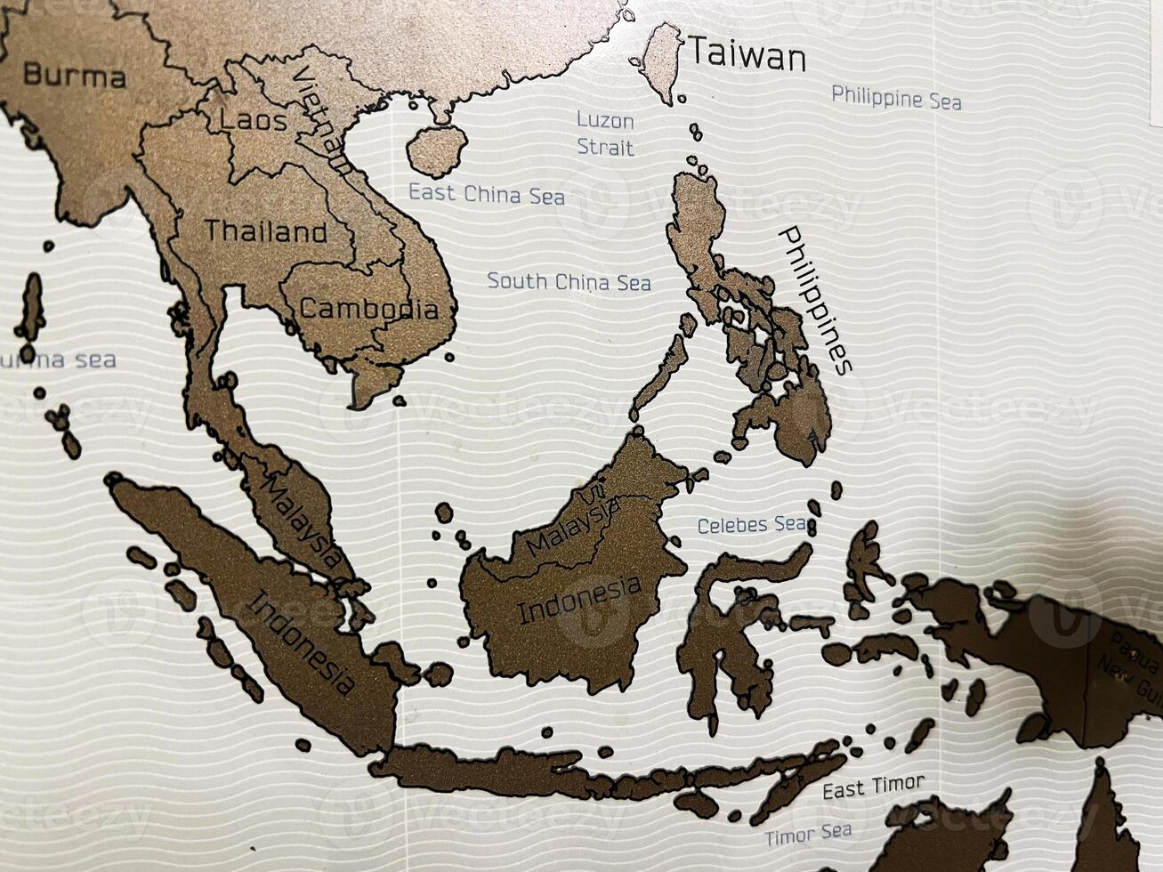 Southeast Asia map displaying countries and surrounding seas with labeled landmarks photo