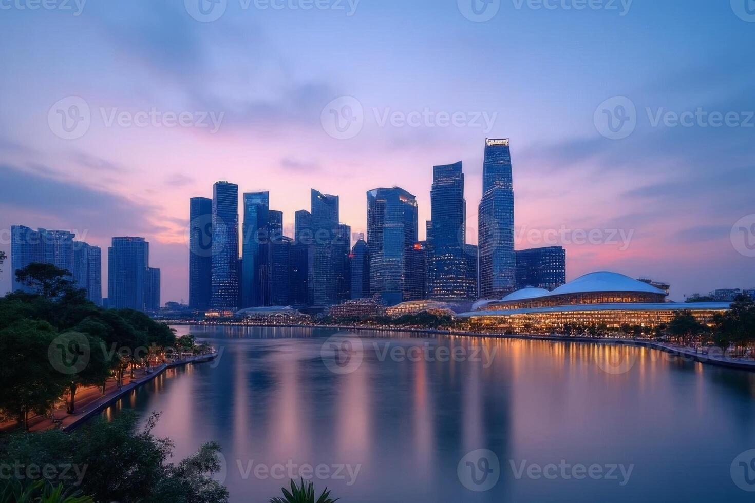Stunning Cityscape at Dusk Modern Skyscrapers Waterfront and Tranquil River Reflections photo