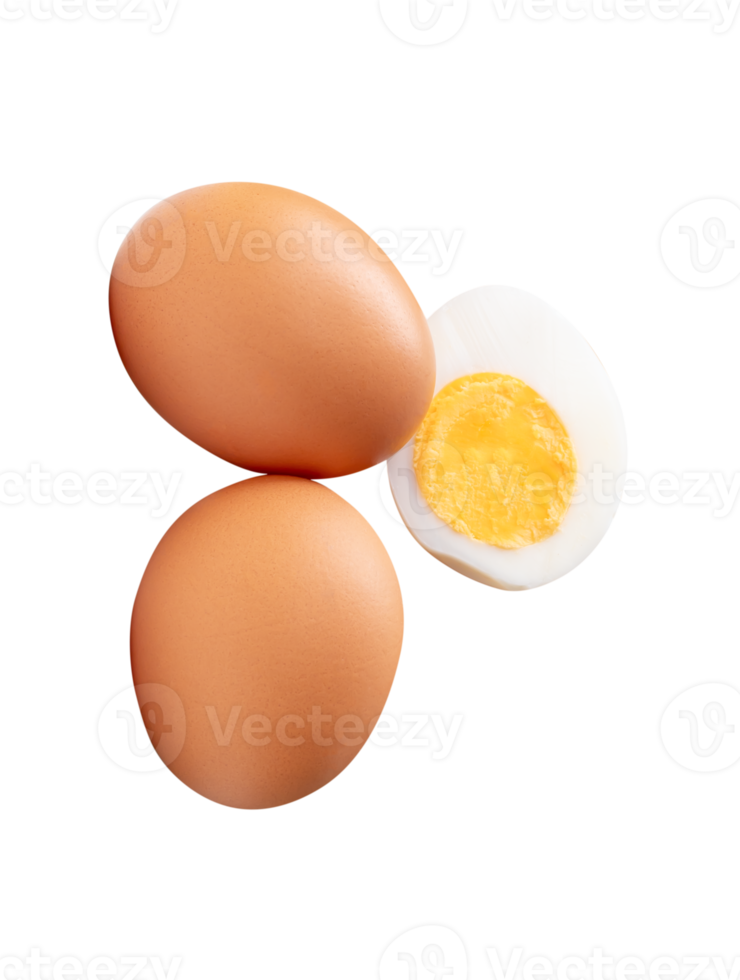 A group of raw chicken eggs and cooked or boiled egg with egg yolk in one half isolated with clipping path in file format png