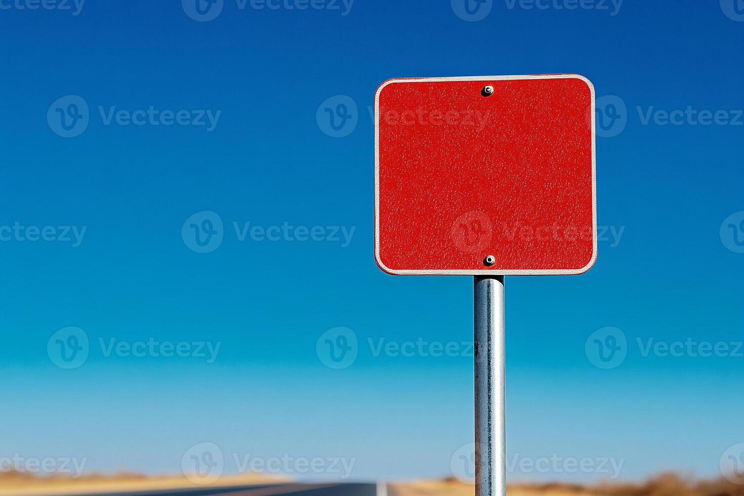 A red traffic sign on a highway photo