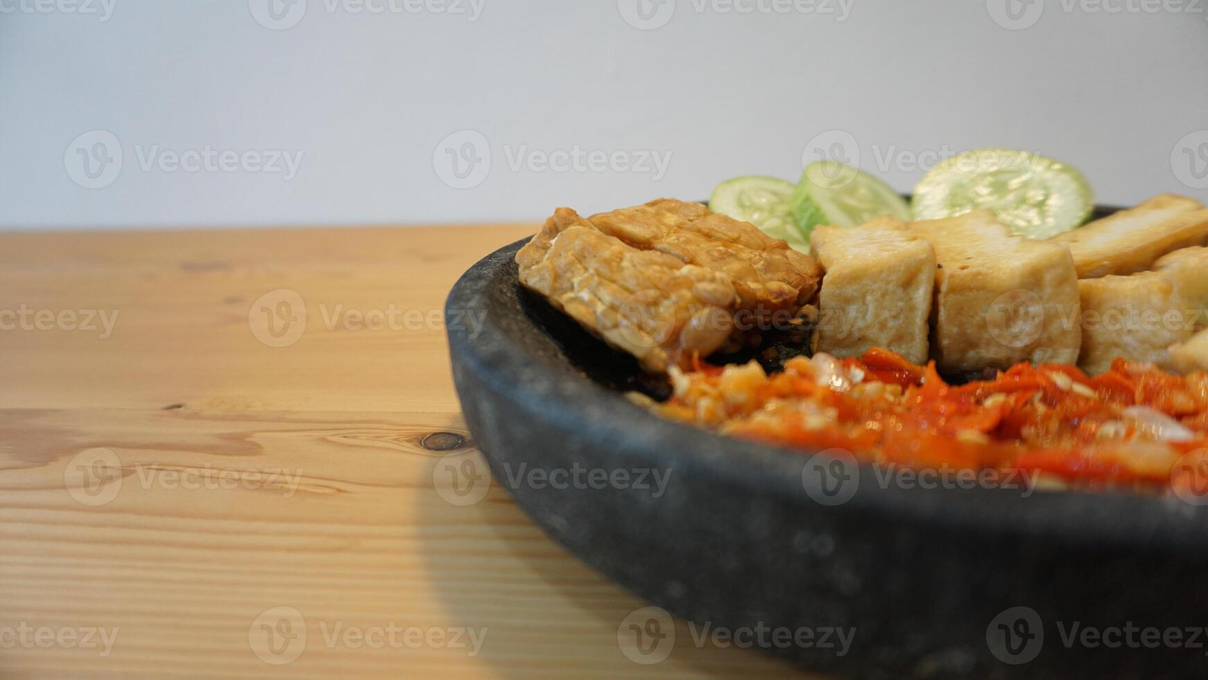 A bowl of food on a table photo
