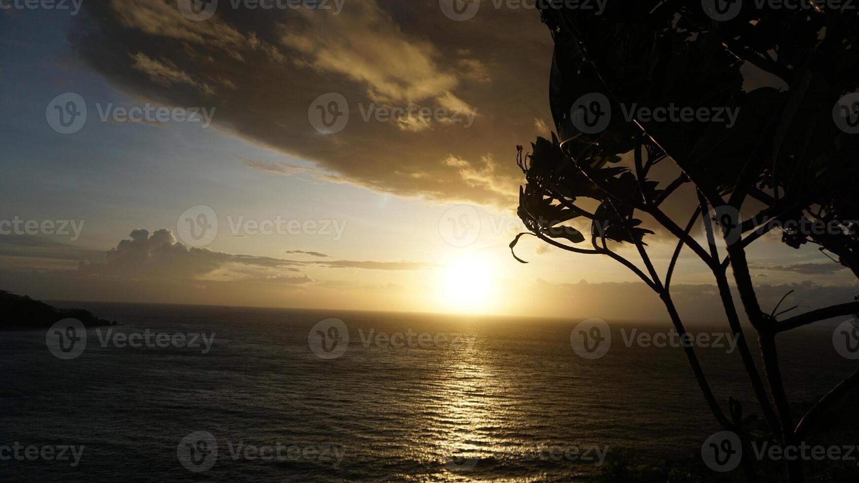 A sunset over the ocean photo