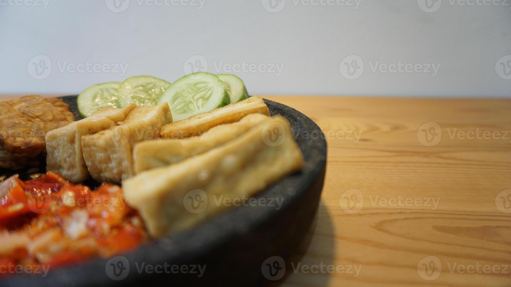 A bowl of food on a table photo