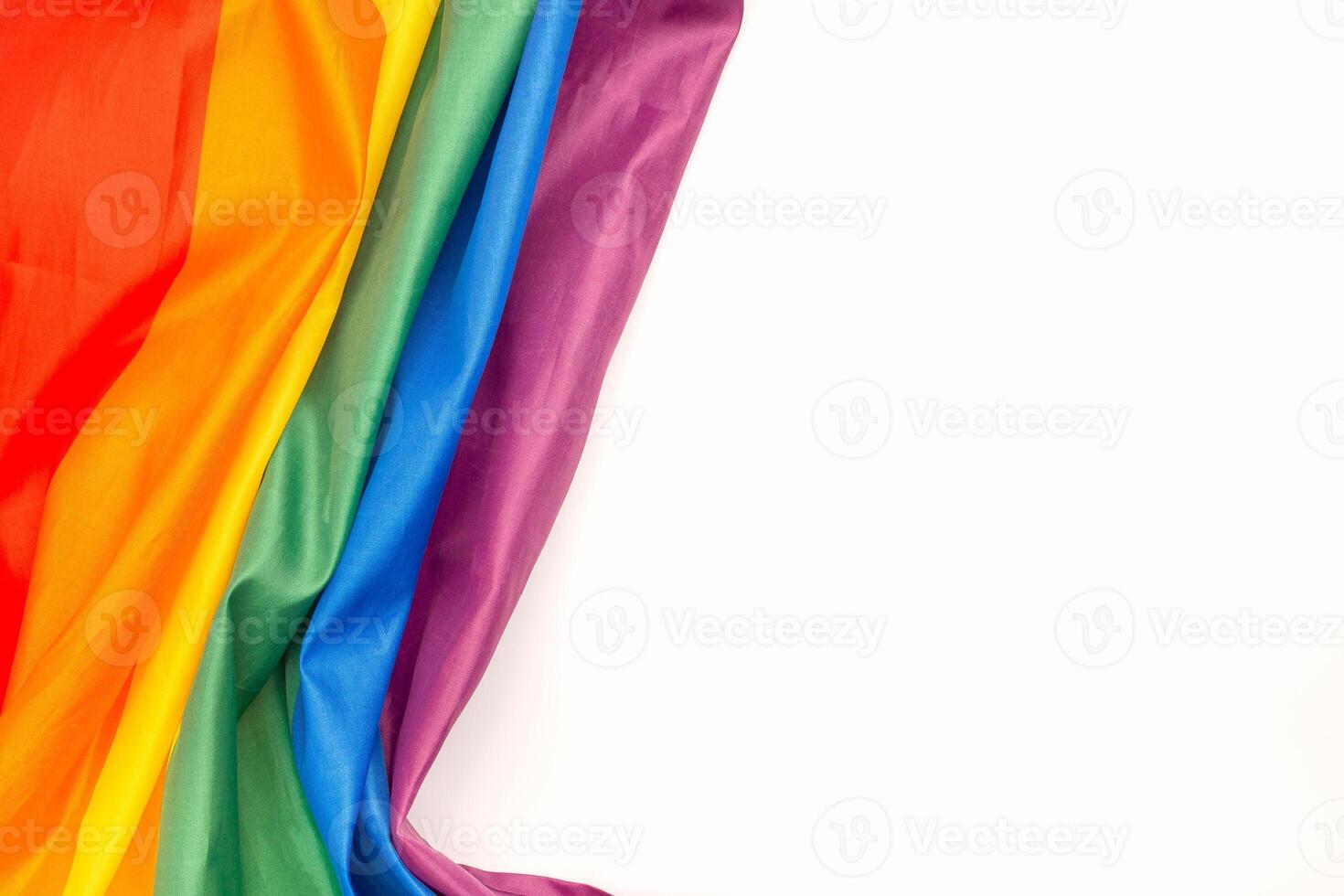 The rainbow flag or LGBTQ flag is isolated on a white background photo
