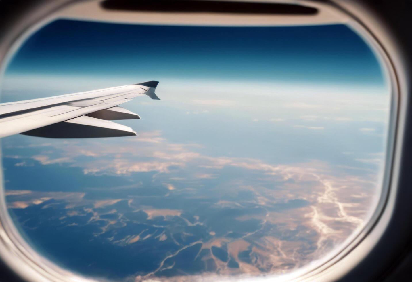 wing high sky A seat window horizon aircraft view altitude landscape clear summer Background Business Travel Cloud Airplane Blue Plane Tourism Transportation photo