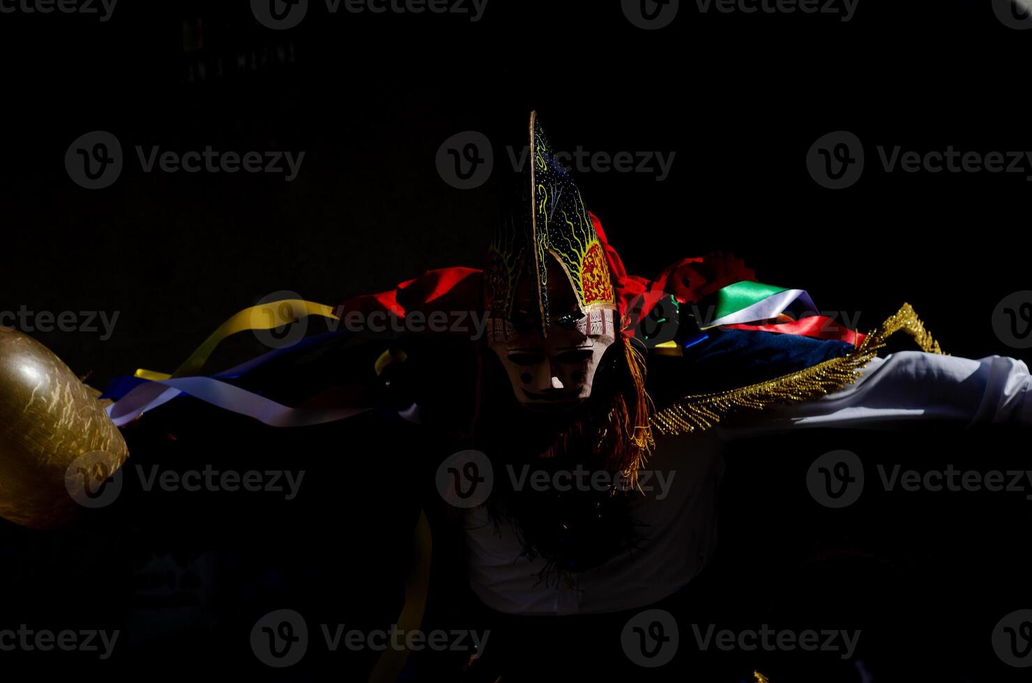 pantalla, the traditional mask of Xinzo de Limia carnival emerging from the shadows, a darklighter photo. Ourense, Galicia. Spain photo