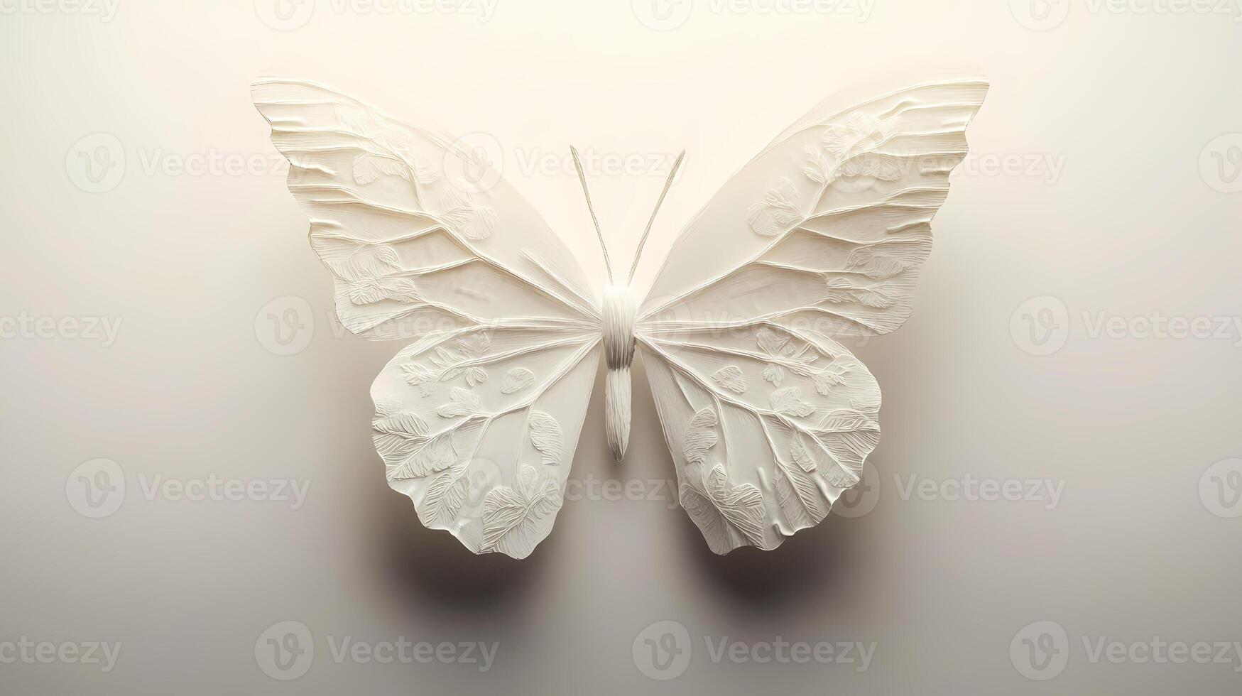 White paper butterfly embossed with delicate floral pattern symbolizing nature photo