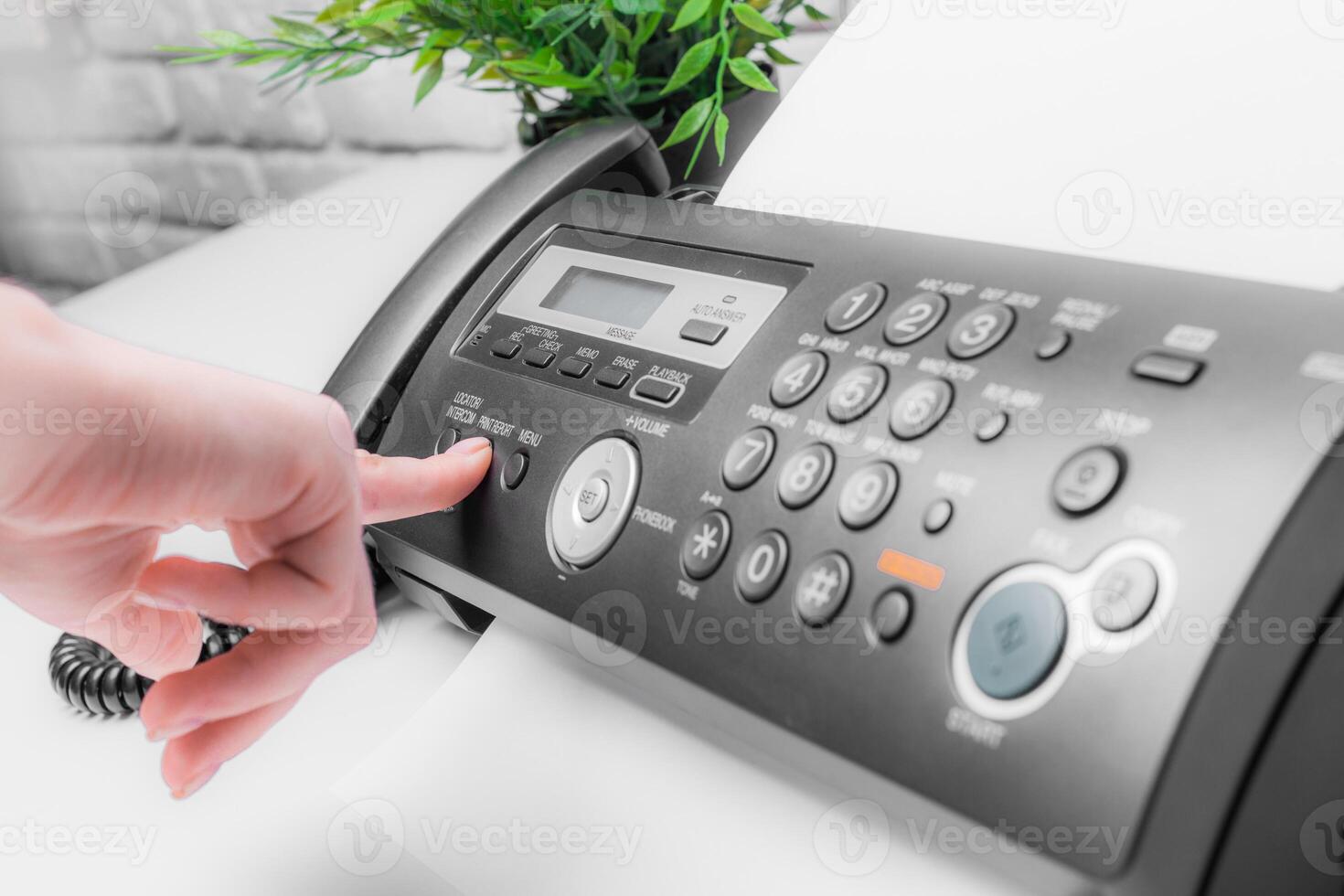 Fax machine close up in an office photo
