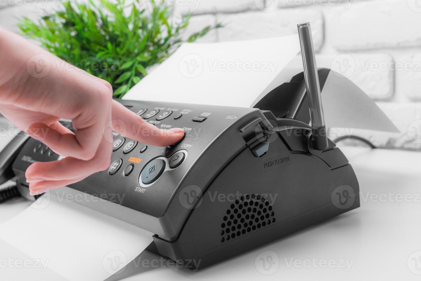 Fax machine close up in an office photo