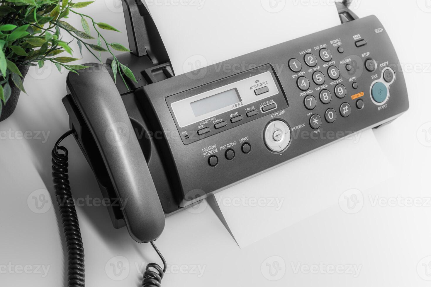 Fax machine close up in an office photo