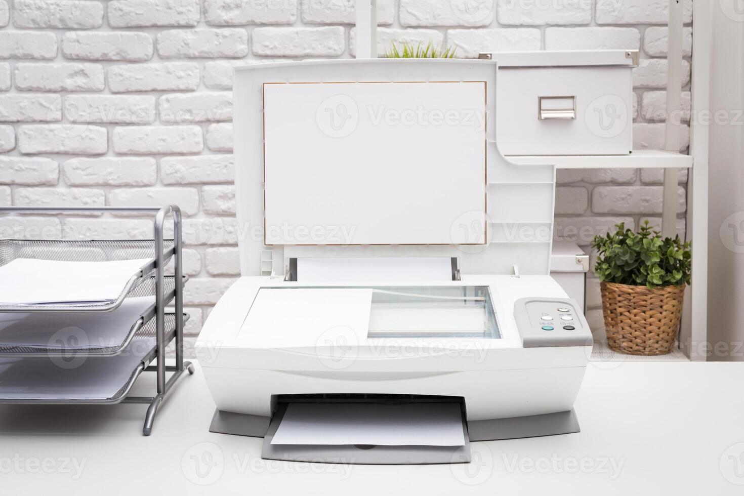 White printer on table close up in office photo