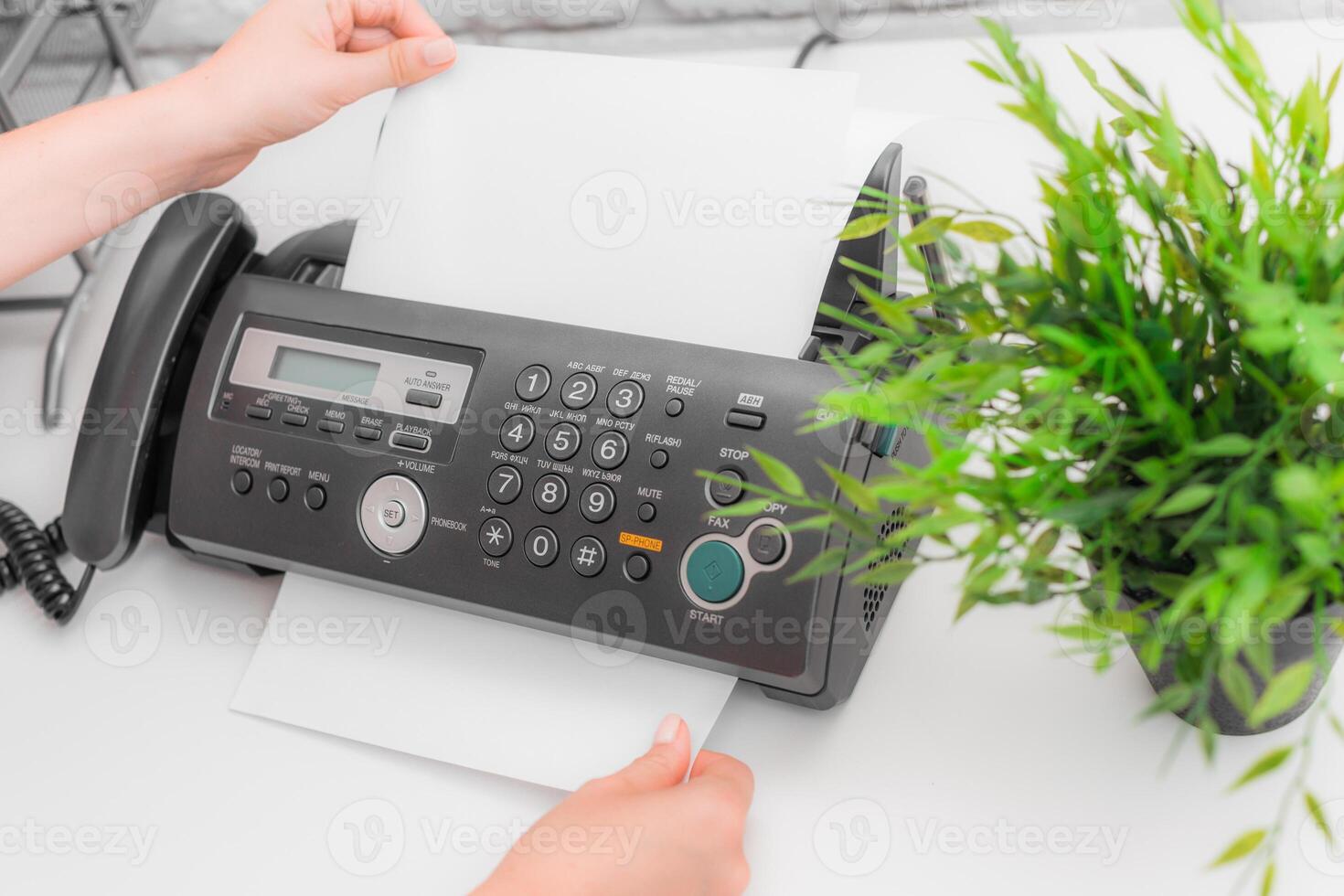 Fax machine close up in an office photo