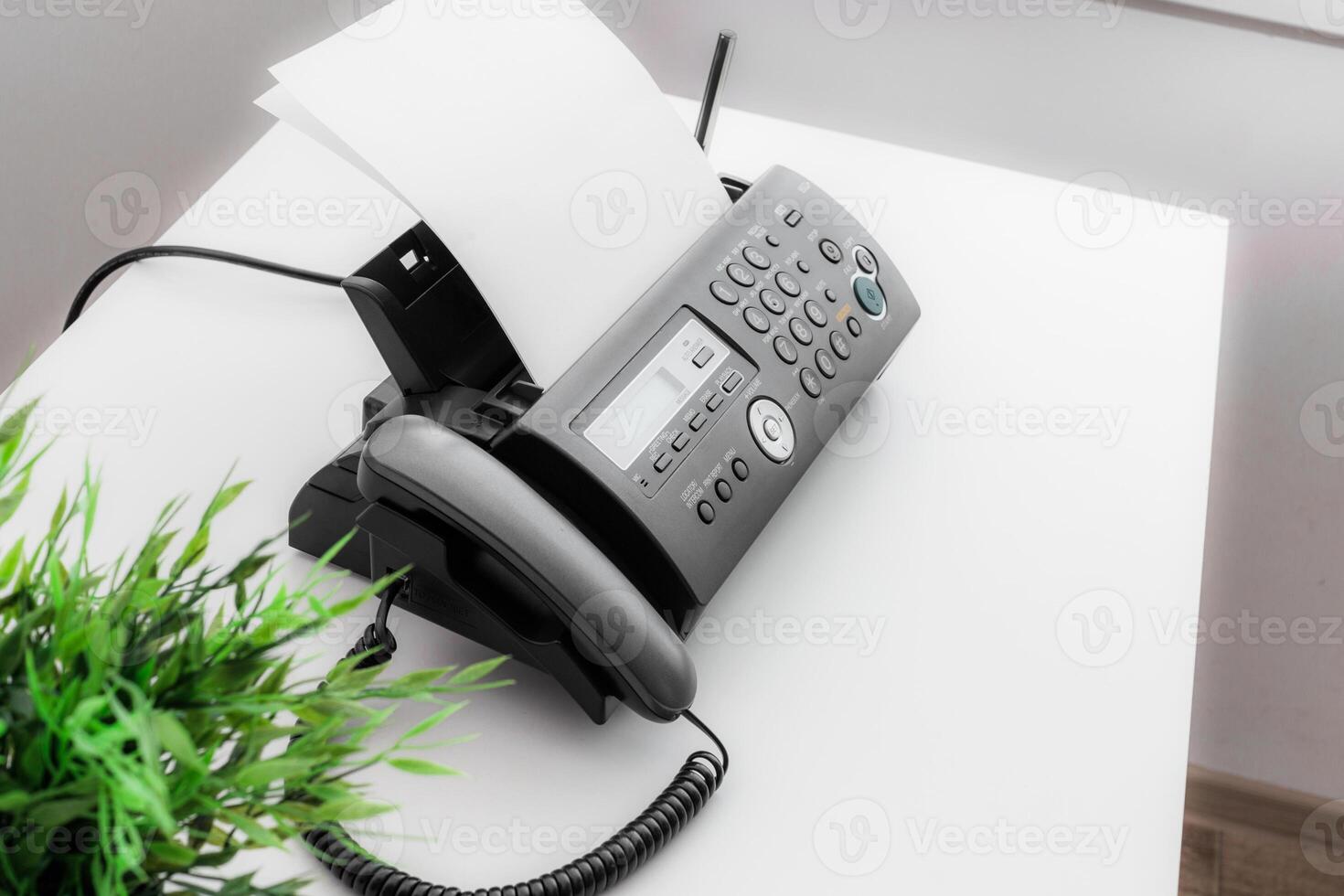 Black fax machine tool close up, business concept photo