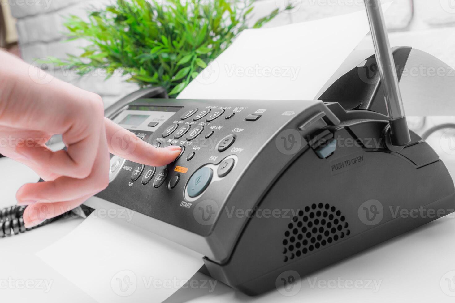 Fax machine close up in an office photo