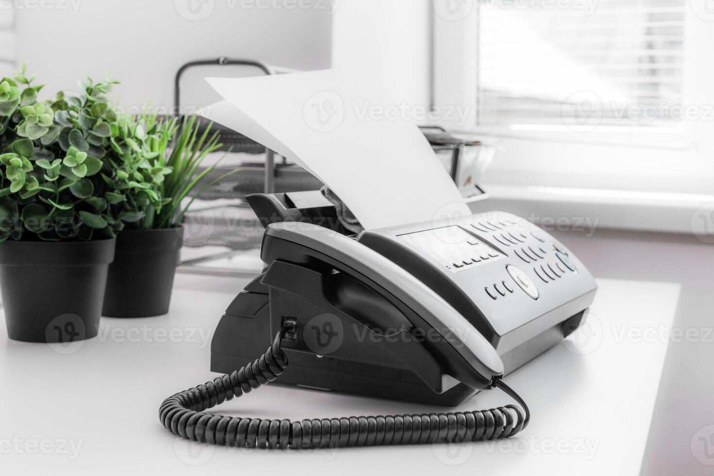 Black fax machine tool close up, business concept photo