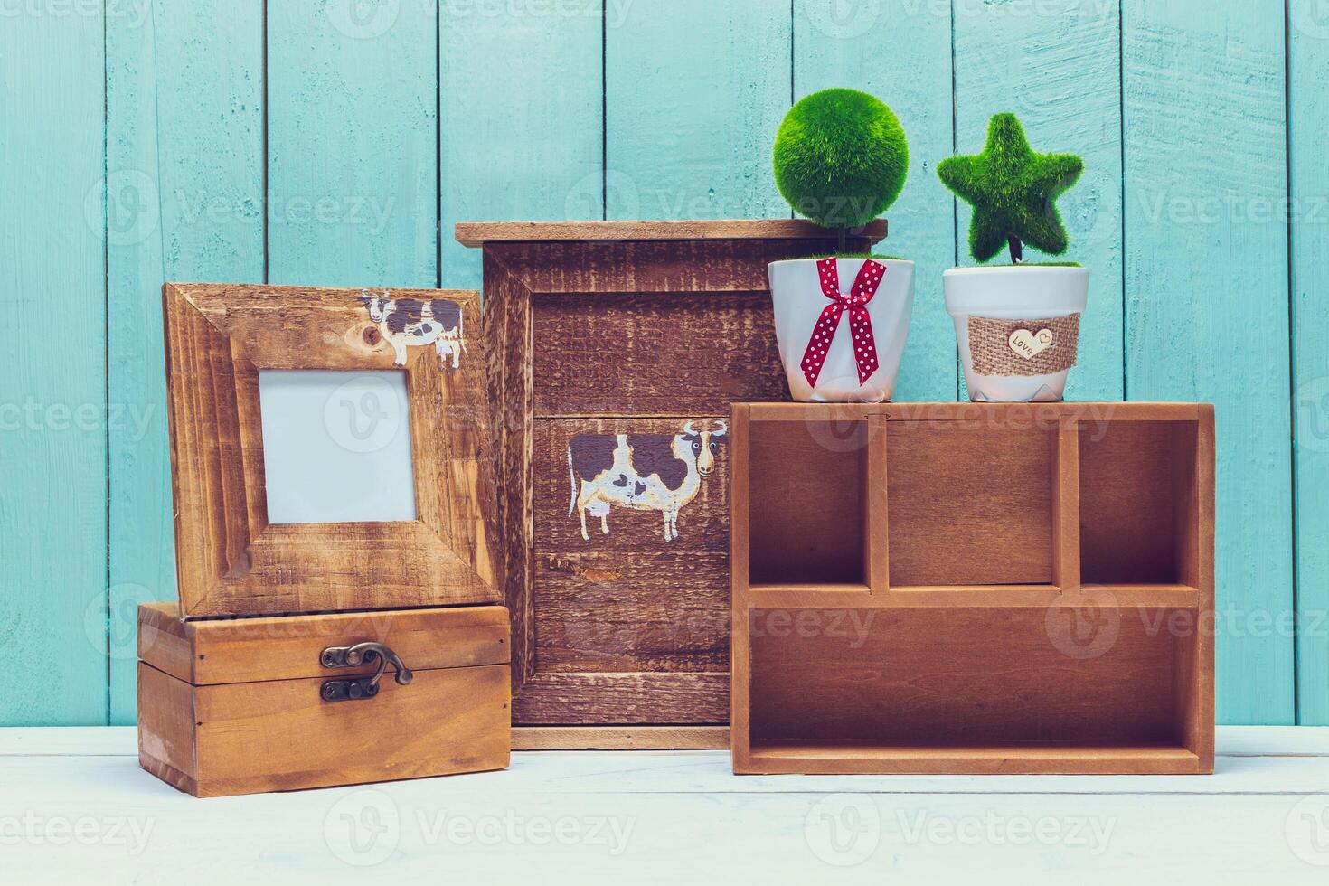 Shabby chic style home decorations on wooden background photo