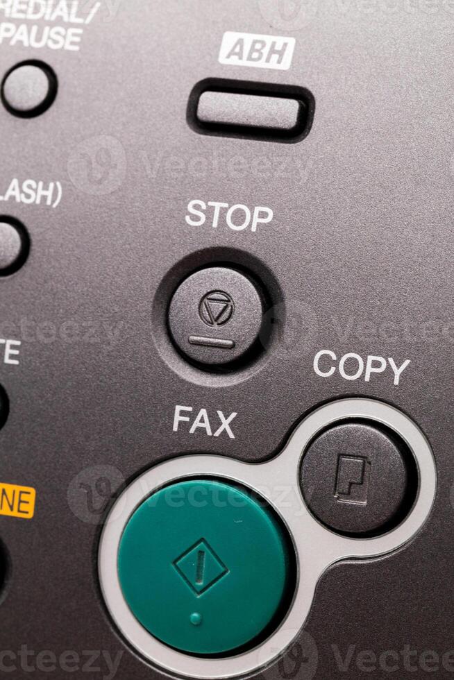 Close up of a fax machine in an office photo