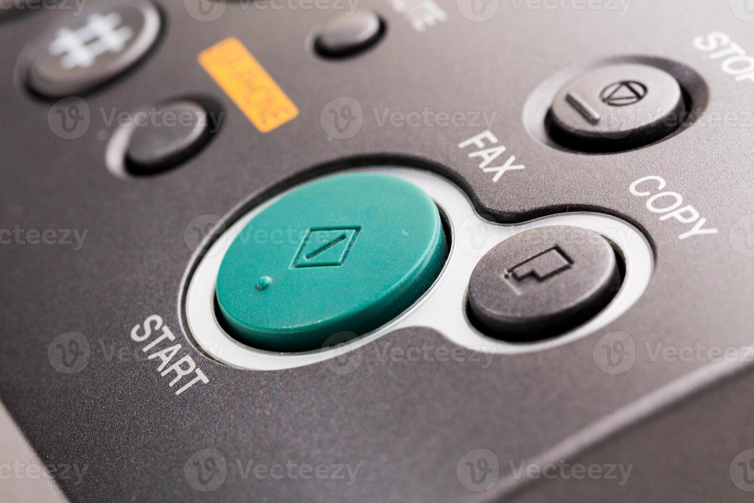 Close up of a fax machine in an office photo