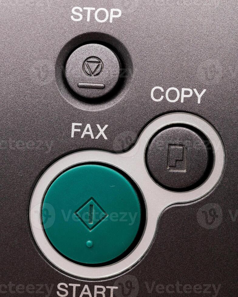 Close up of a fax machine in an office photo