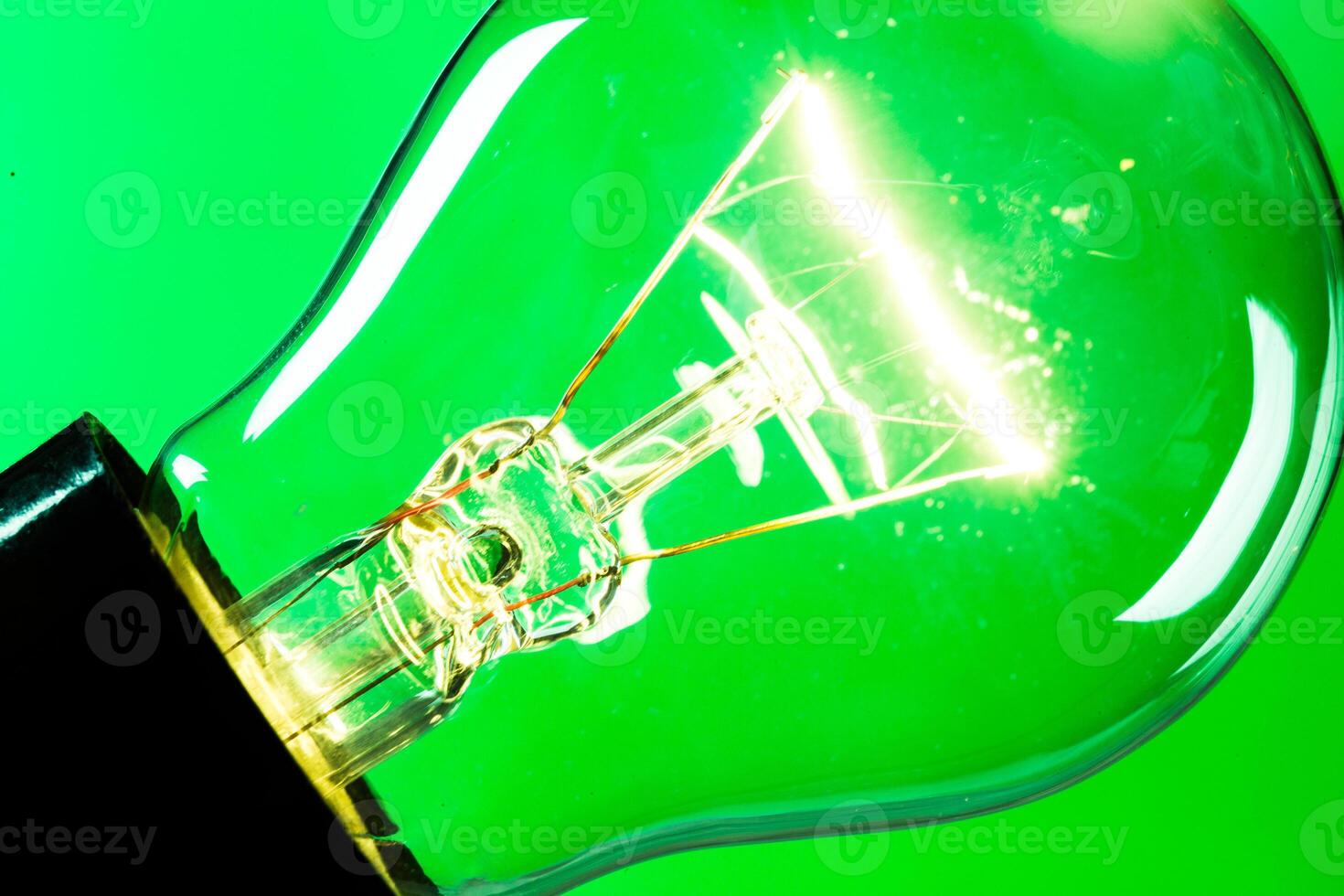 Close up of an illuminated light bulb photo