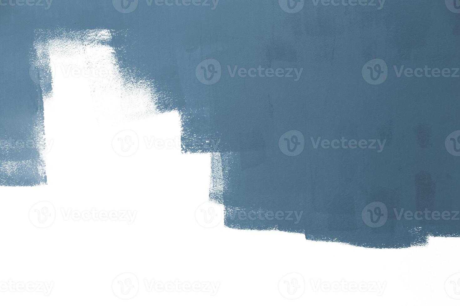 Painting on white surface wall by the roller brush photo
