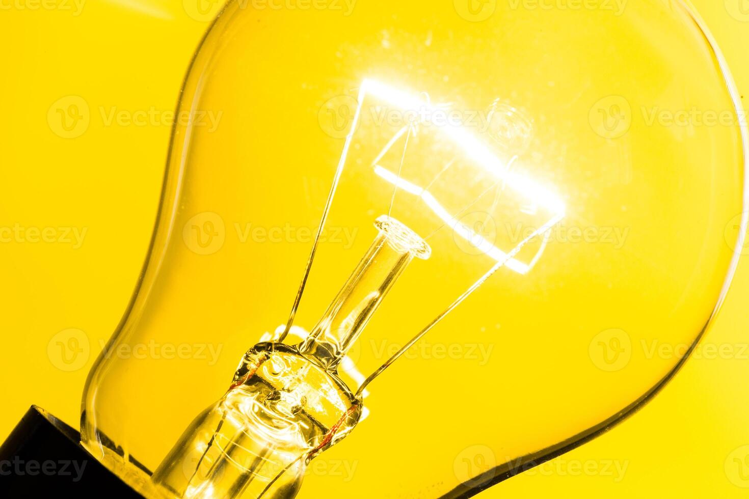 Close up of an illuminated light bulb photo