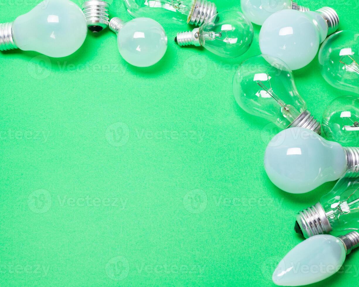 light bulb on green background close up photo