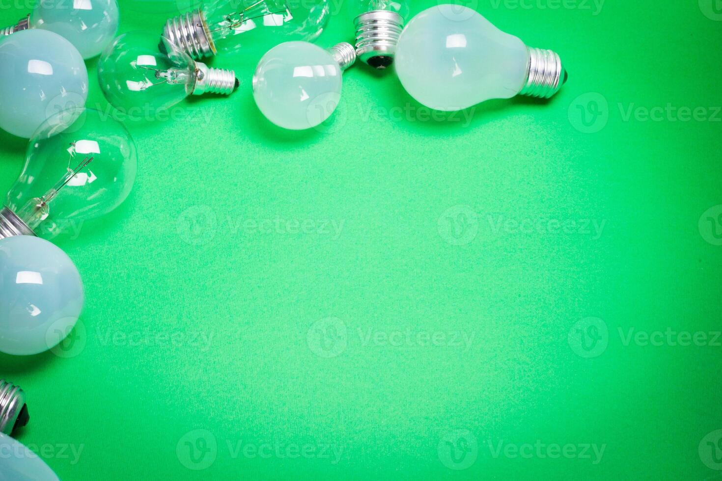 light bulb on green background close up photo