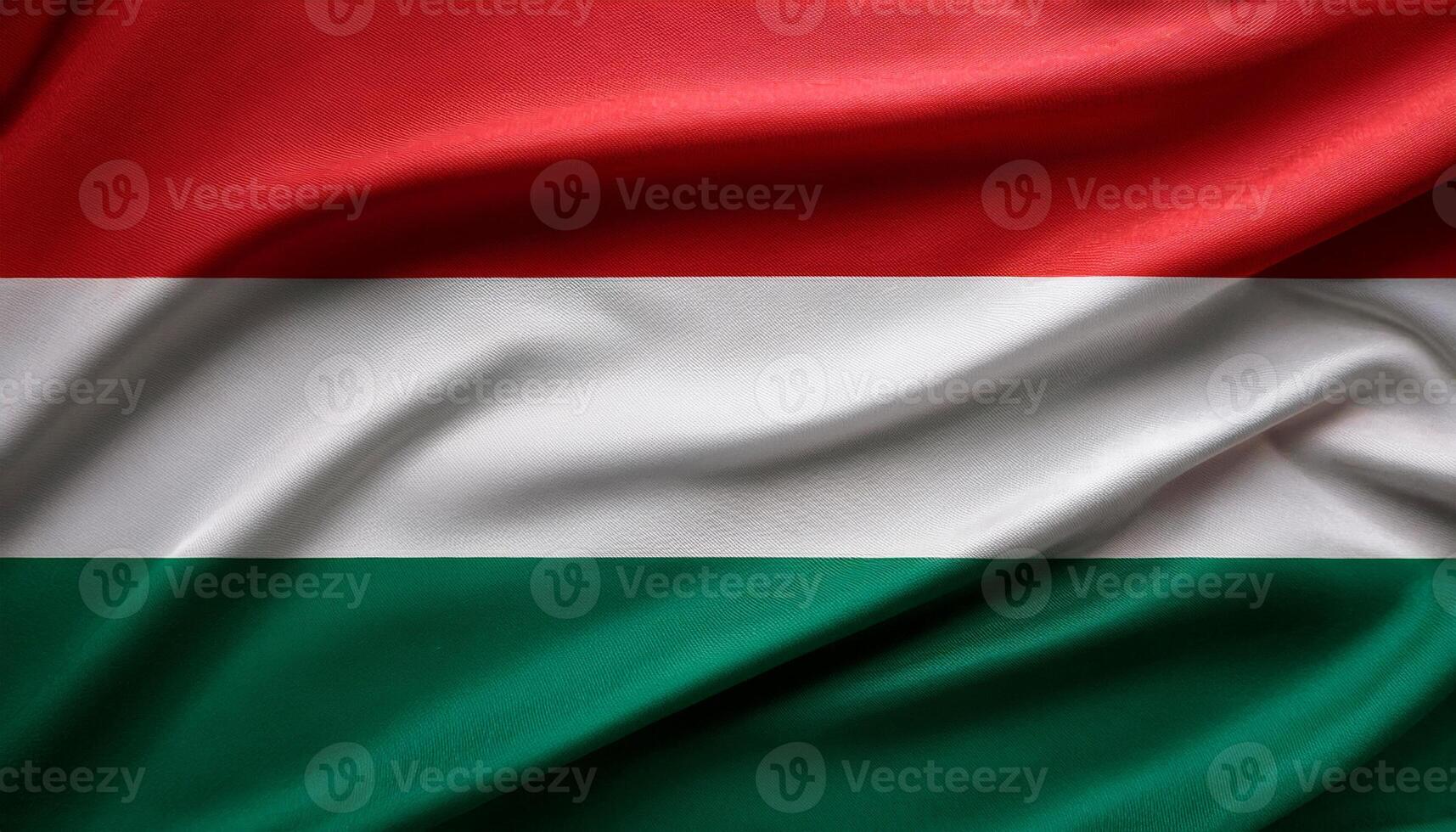 Hungary national flag with realistic fabric texture and smooth folds waving in the wind. photo