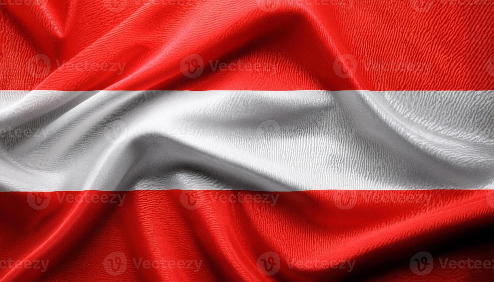 Austria national flag with realistic fabric texture and smooth folds waving in the wind photo