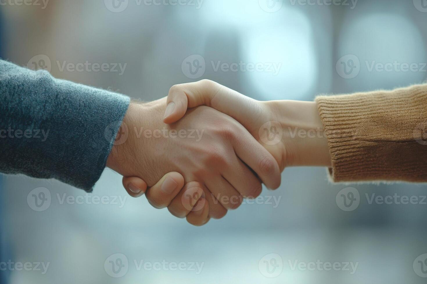 Hands shake. Close up handshake image. Two people handshaking. Agreement or cooperation concept. Success deal or business partnership. Making a deal. photo